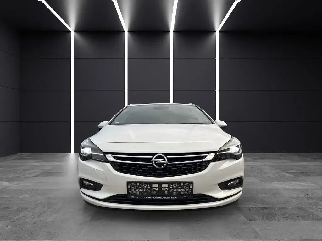 Gebraucht Opel Astra Dynamic 200 PS (147 kW) 2016 Schneeweiss/summitwhite/arctic Kombi