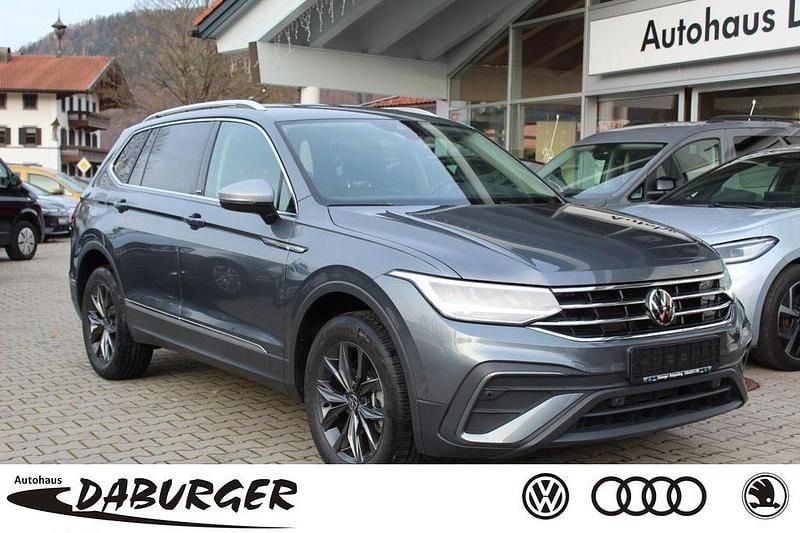 Grau Gebraucht 2023 VW Tiguan Allspace Move SUV | 33.990 € (Superpreis) - Bild 1/4