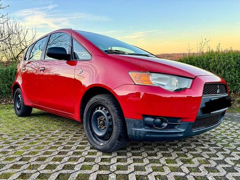 Gebraucht Mitsubishi Colt 95 PS (69 kW) 2009 Rot Kleinwagen