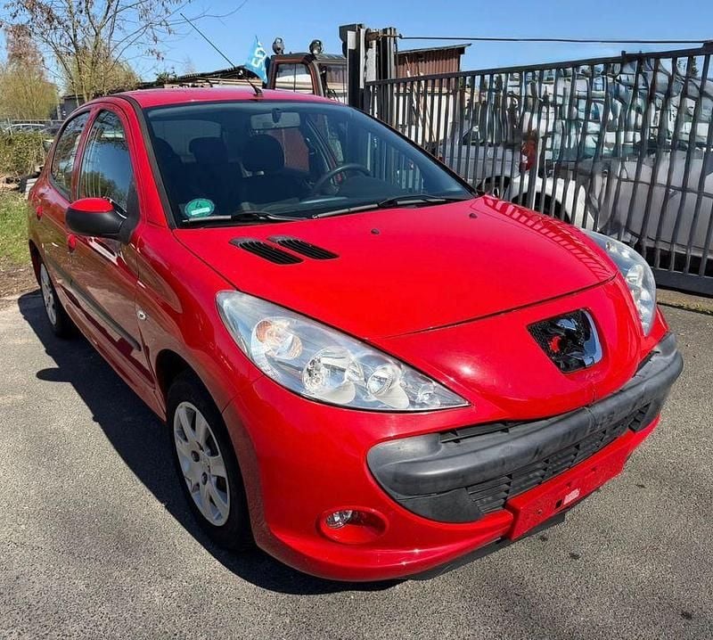 Usado Peugeot 206 Basis 75 HP (55 kW) 2009 Vermelho Sedan