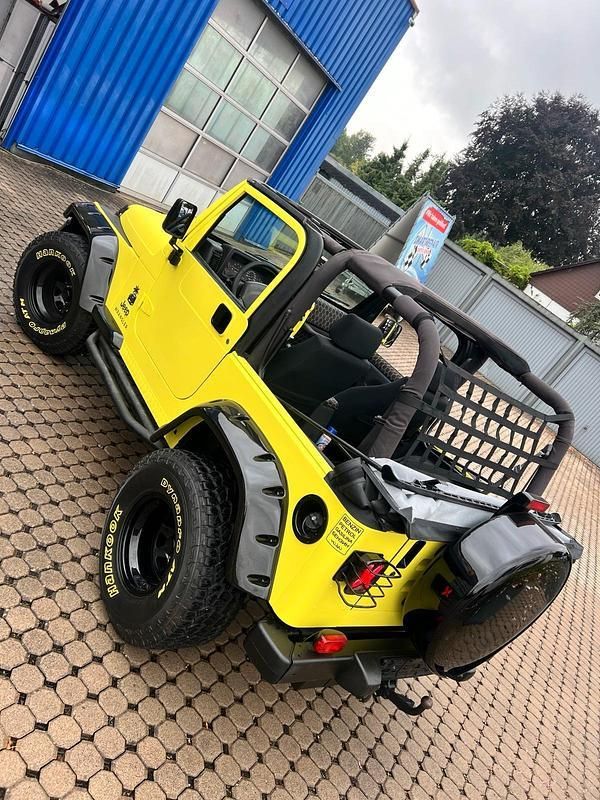 Gelb Gebraucht 2001 Jeep Wrangler SUV | 26.999 € - Bild 1/4
