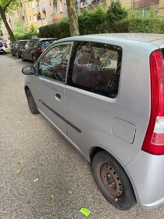 Gebraucht Daihatsu Cuore Plus 58 PS (42 kW) 2004 Grau Kleinwagen