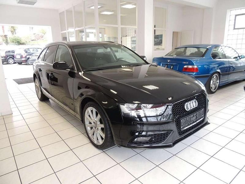 Używany Audi A4 Attraction 170 KM (125 kW) 2013 Czarny Kombi