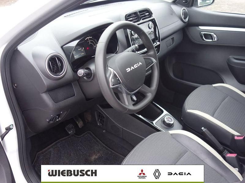 Gebraucht Dacia Spring Essentiel 33 kW (45 PS) 2023 Kaolinweiß Kleinwagen