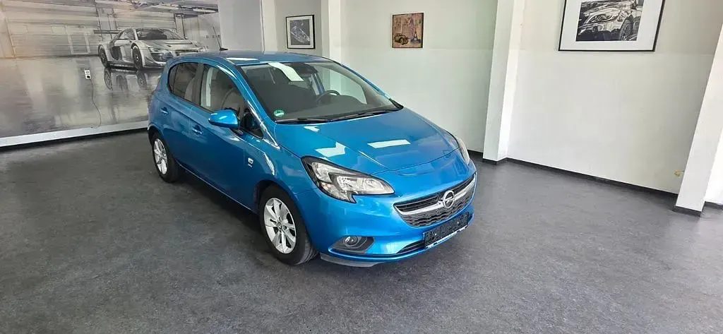 Gebraucht Opel Corsa drive 90 PS (66 kW) 2016 Blau Kleinwagen