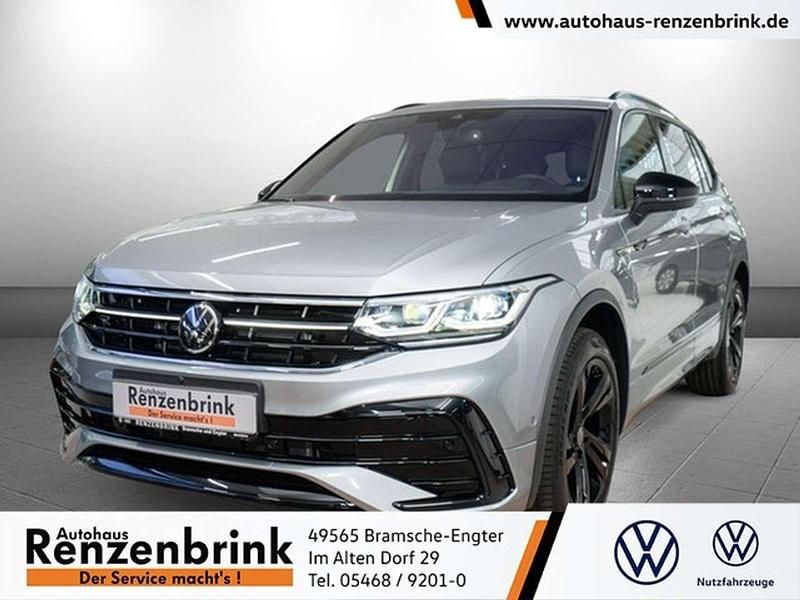 Pyritsilber metallic Gebraucht 2024 VW Tiguan Allspace Business SUV | 51.990 € - Bild 1/4