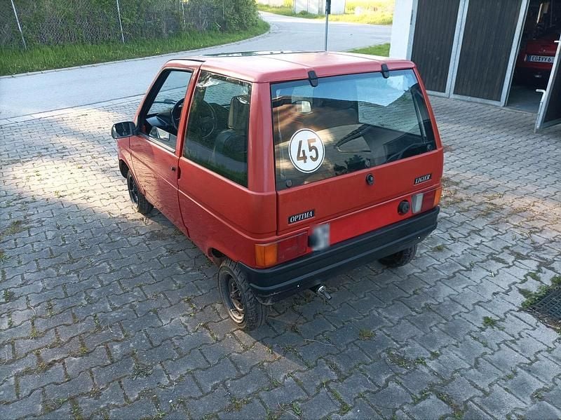 Begagnad Ligier Optima 1992 Röd Halvkombi