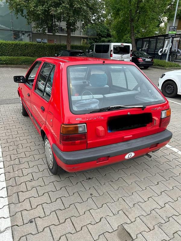 Rot Gebraucht 1992 Nissan Micra Kleinwagen | 1.900 € - Bild 1/4