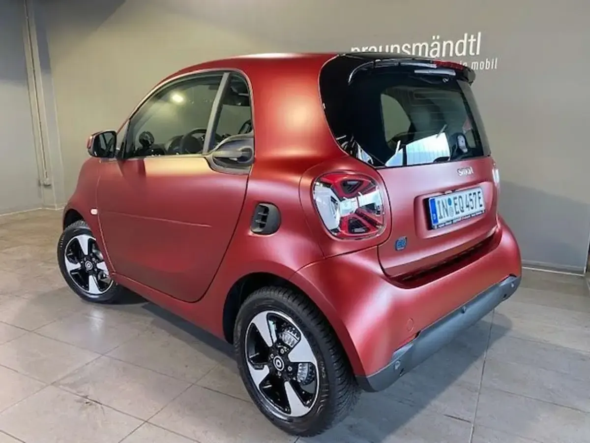 Gebraucht Smart ForTwo Electric Drive Passion 60 kW (82 PS) 2023 Bodypanels in carmine red (mat Coupé