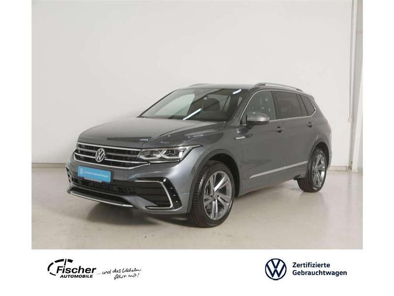 Grau Gebraucht 2024 VW Tiguan Allspace R-line SUV | 46.940 € (Fairer Preis) - Bild 1/3