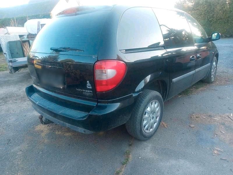Używany Chrysler Voyager 150 KM (110 kW) 2006 Czarny Minivan