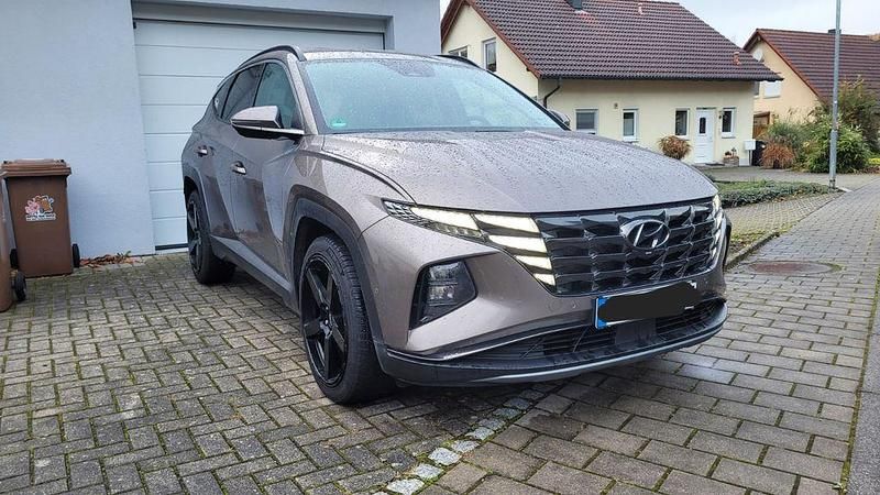 Braun Gebraucht 2023 Hyundai Tucson Prime SUV | 29.800 € (Fairer Preis) - Bild 1/4