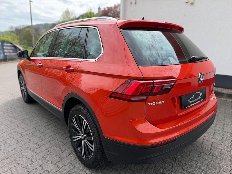 Second-hand VW Tiguan Sound 150 CP (110 kW) 2017 Portocaliu SUV