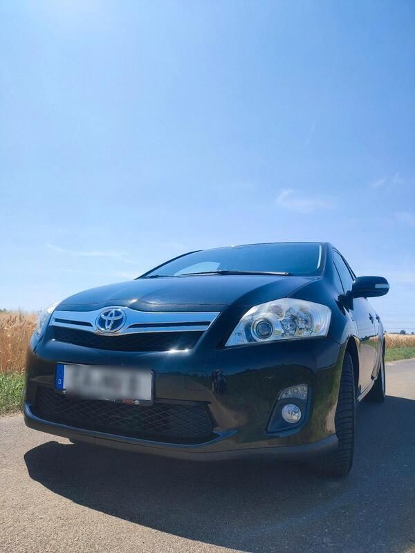 Schwarz Gebraucht 2010 Toyota Auris Hybrid Limousine | 7.800 € - Bild 1/4