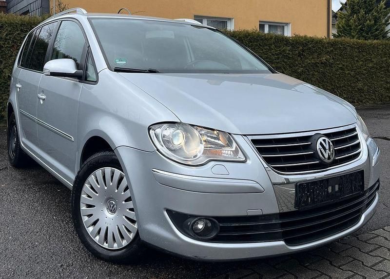 Silber Gebraucht 2007 VW Touran Van / Kleinbus | 5.680 € (Fairer Preis) - Bild 1/4