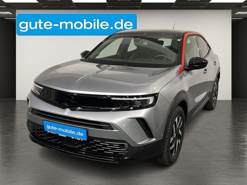 Grau Gebraucht 2023 Opel Mokka-e GS Line SUV | 19.690 € (Guter Preis) - Bild 1/4