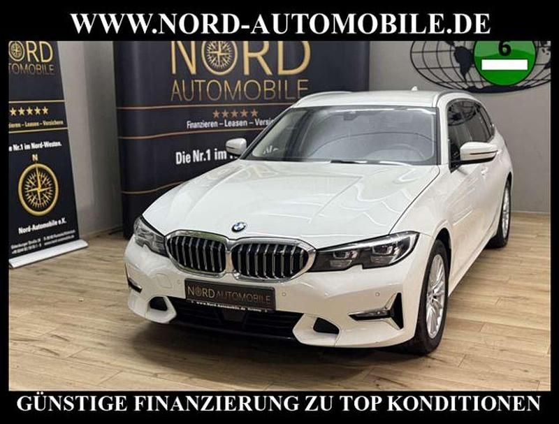 Alpinweiß iii Gebraucht 2021 BMW 330 Luxury Line Kombi | 34.950 € (Fairer Preis) - Bild 1/3