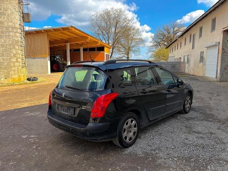 Gebraucht Peugeot 308 SW 111 PS (81 kW) 2011 Schwarz Kombi