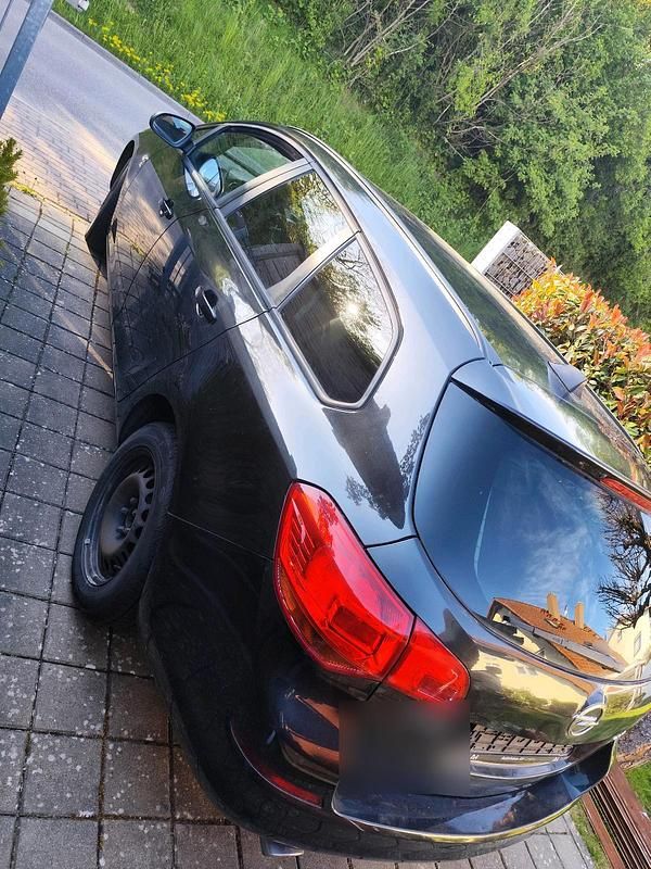 Second-hand Opel Astra 140 CP (102 kW) 2012 Negru Break