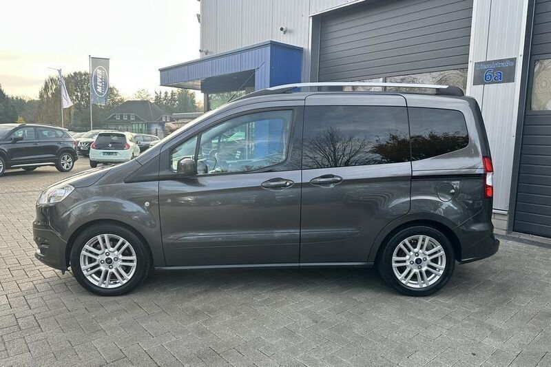 Gebraucht Ford Tourneo Courier 101 PS (74 kW) 2015 Grau (magneticgrau) Van / Kleinbus