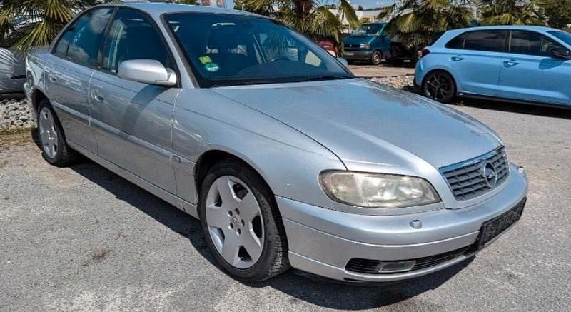 Second-hand Opel Omega 179 CP (131 kW) 2002 Argintiu Berlinǎ