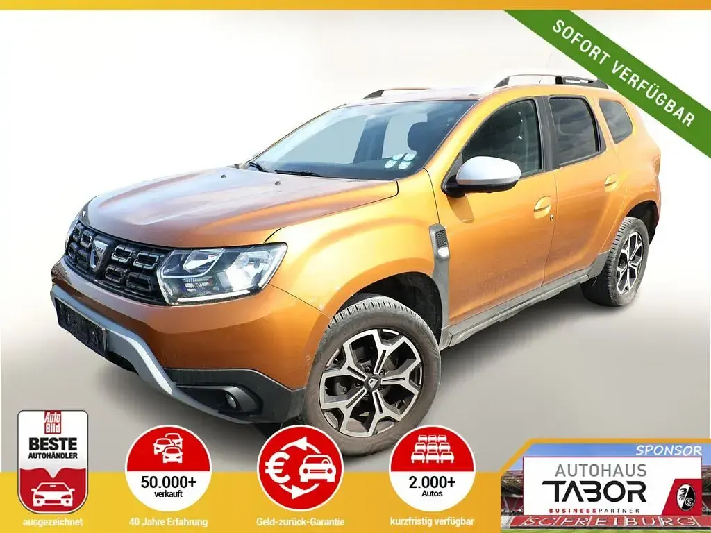 Używany Dacia Duster Prestige 101 KM (74 kW) 2021 Pomarańczowy SUV