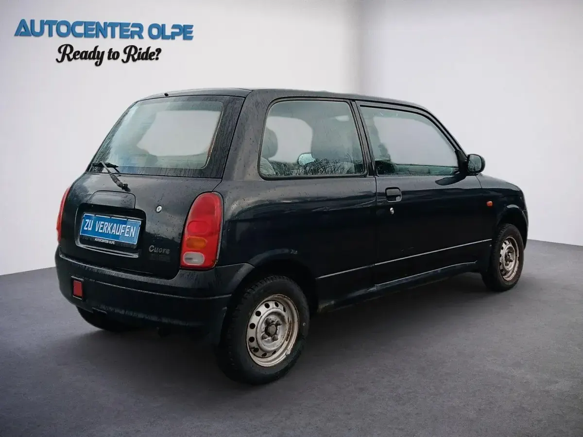 Gebraucht Daihatsu Cuore 56 PS (41 kW) 1999 Schwarz Kleinwagen