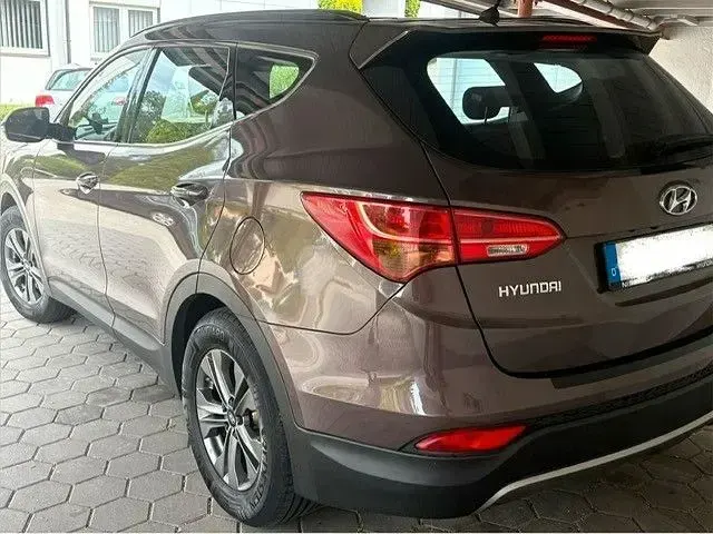 Gebraucht Hyundai Santa Fe Trend 192 PS (141 kW) 2015 Braun SUV