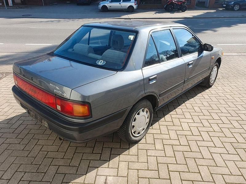 Second-hand Mazda 323 84 CP (61 kW) 1991 Gri Berlinǎ