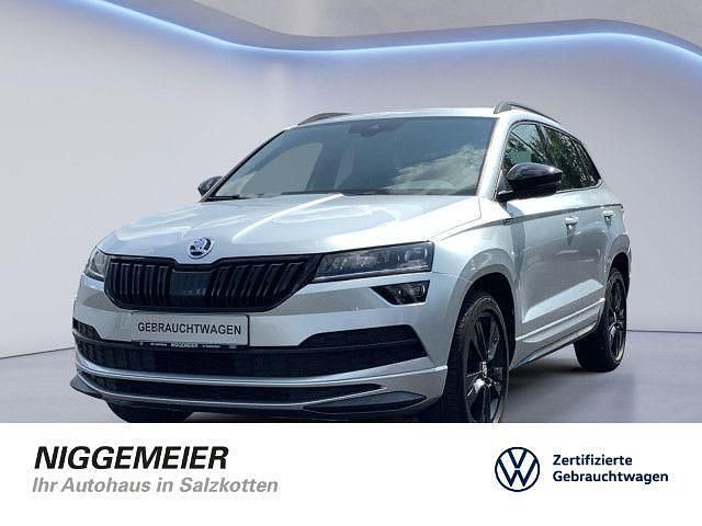 Brillantsilber Gebraucht 2020 Skoda Karoq SportLine SUV | 21.960 € (Fairer Preis) - Bild 1/4