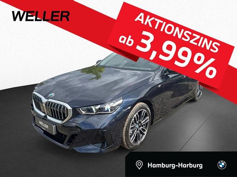 Carbonschwarz (schwarz) Gebraucht 2024 BMW 520 M Sport Kombi | 52.850 € (Fairer Preis) - Bild 1/3