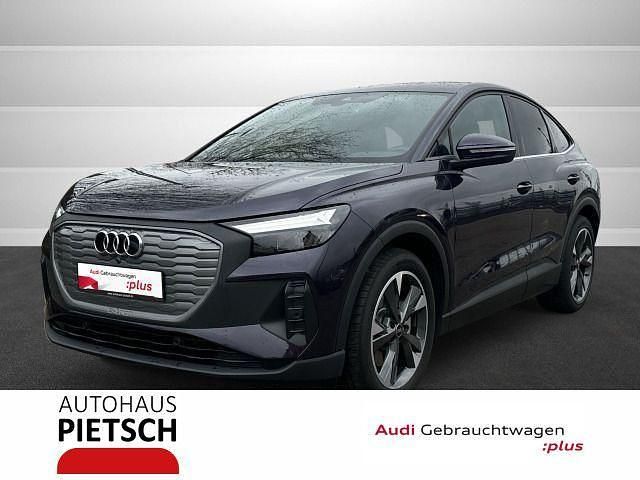 Violett Gebraucht 2024 Audi Q4 Sportback e-tron Sport SUV | 43.520 € - Bild 1/4