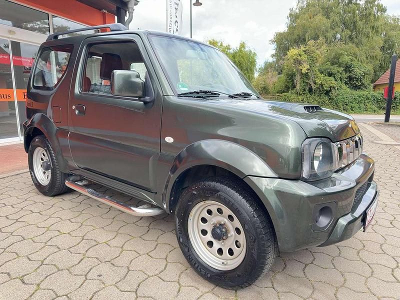 Grün Gebraucht 2017 Suzuki Jimny Club SUV | 16.950 € (Fairer Preis) - Bild 1/4