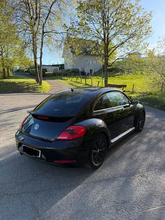 Gebraucht VW Beetle Exclusive 105 PS (77 kW) 2013 Schwarz Kleinwagen
