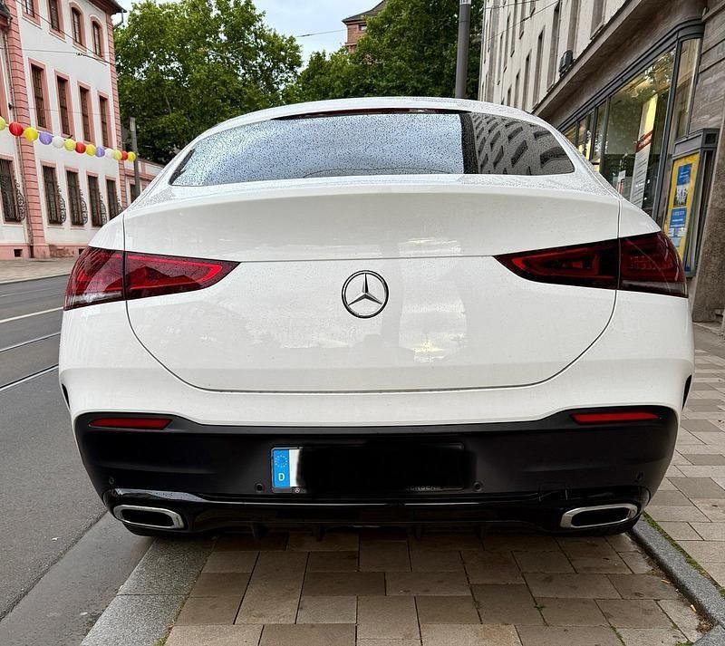 Weiß Gebraucht 2023 Mercedes GLE400 AMG line Coupé | 74.000 € (Superpreis) - Bild 1/4