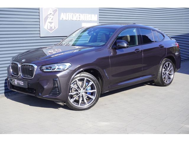 (sophistograu brillianteffekt metallic) Gebraucht 2021 BMW X4 SUV | 65.438 € - Bild 1/4