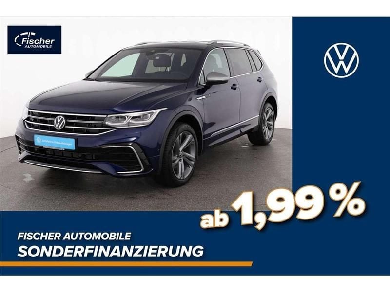 Blau Gebraucht 2024 VW Tiguan Allspace R-line SUV | 42.940 € (Fairer Preis) - Bild 1/3