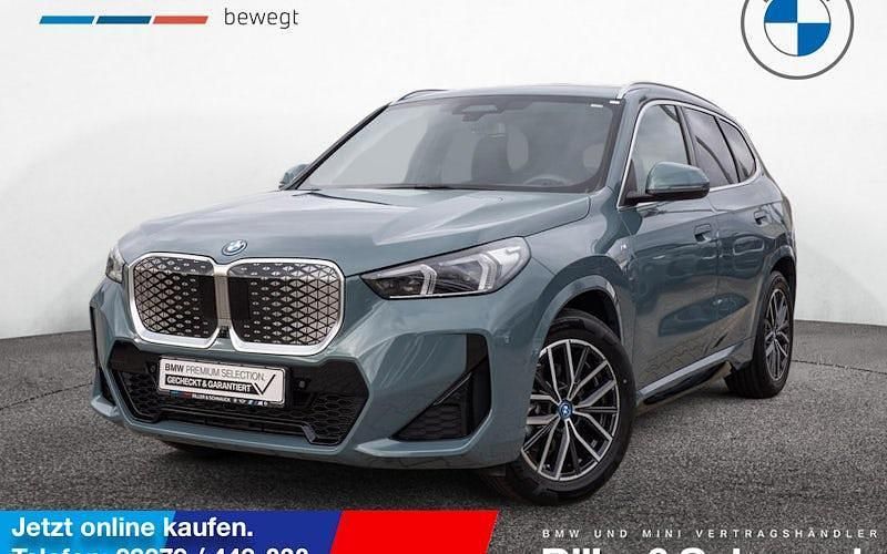 Grün Gebraucht 2023 BMW iX1 Performance SUV | 45.900 € (Etwas zu teuer) - Bild 1/4