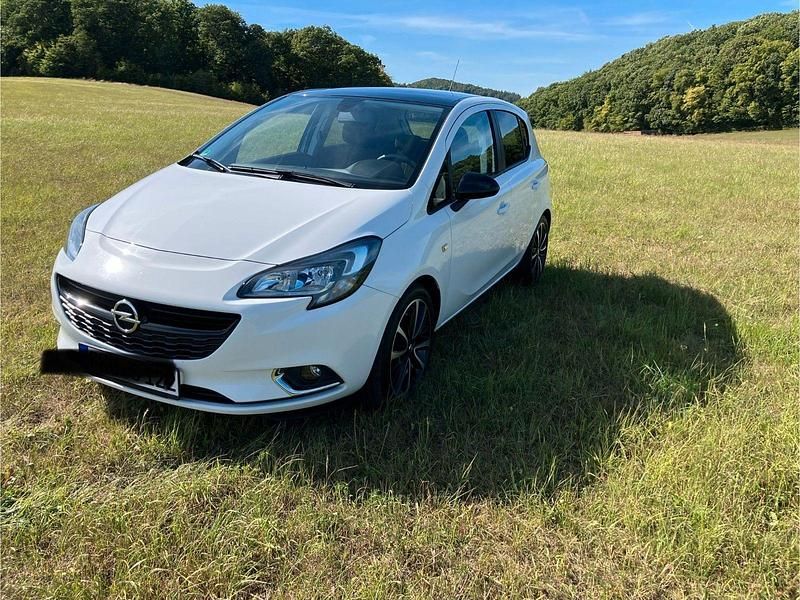 Weiß Gebraucht 2016 Opel Corsa Color Edition Kleinwagen | 7.890 € (Fairer Preis) - Bild 1/4