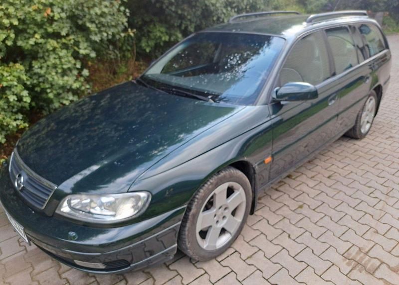 Grün Gebraucht 2000 Opel Omega Kombi | 1.499 € (Fairer Preis) - Bild 1/4