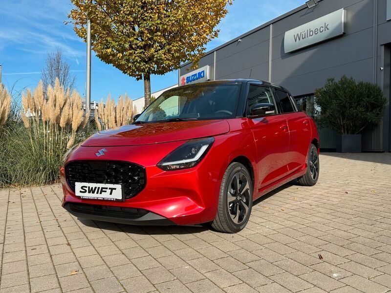Rot Neu 2025 Suzuki Swift Comfort+ Limousine | 22.990 € - Bild 1/4