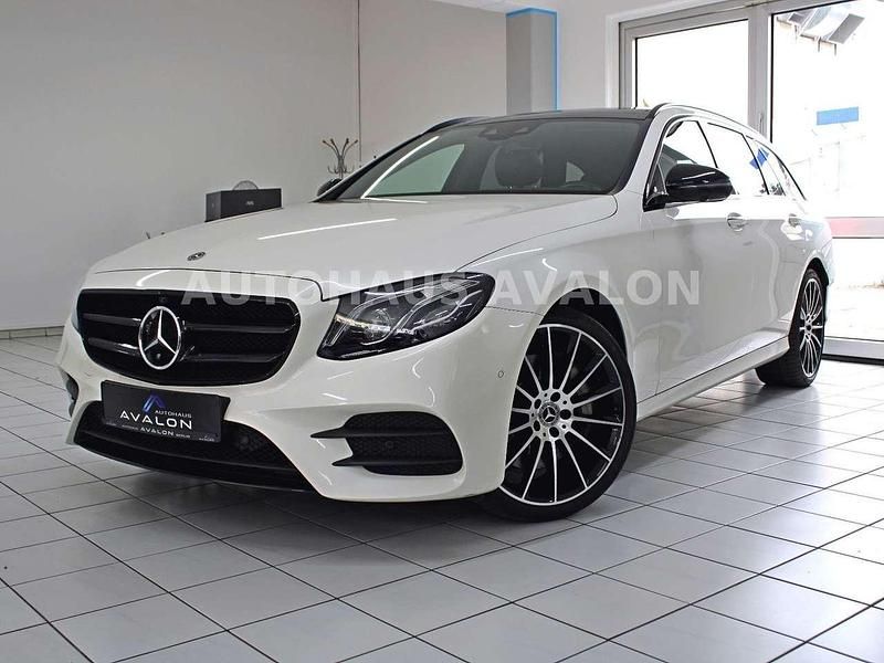 Designo diamantweiß bright met Gebraucht 2018 Mercedes E350 AMG Kombi | 35.980 € (Teuer) - Bild 1/4
