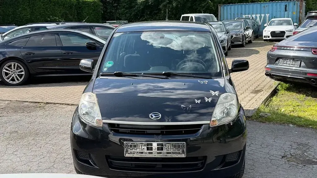 Gebraucht Daihatsu Sirion 69 PS (50 kW) 2009 Schwarz Kleinwagen