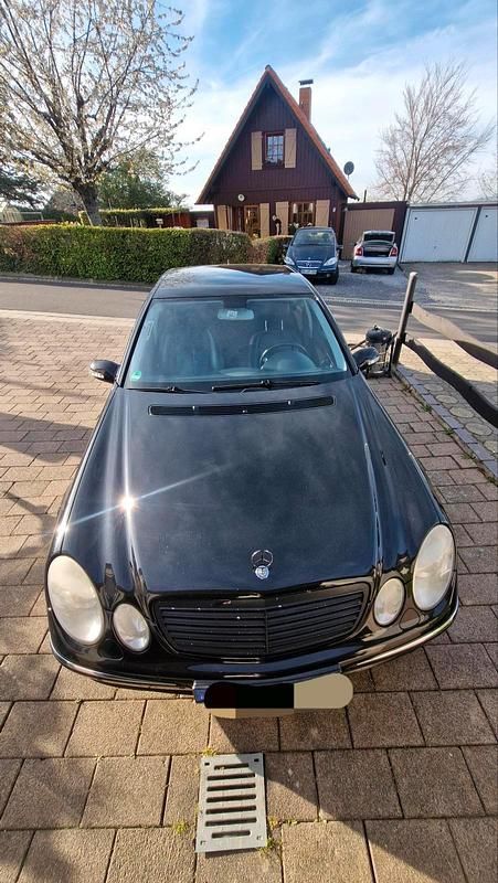 Second-hand Mercedes E200 Avantgarde 163 CP (119 kW) 2005 Negru Berlinǎ