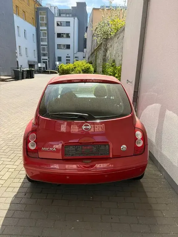 Gebraucht Nissan Micra 65 PS (47 kW) 2009 Rot Limousine