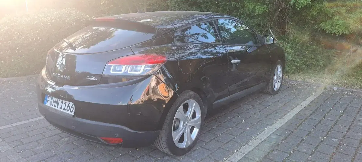 Gebraucht Renault Mégane Coupé Dynamique 131 PS (96 kW) 2011 Schwarz Coupé