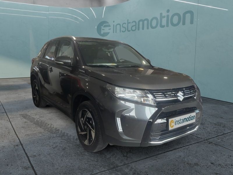 Grau Gebraucht 2025 Suzuki Vitara Comfort+ SUV | 26.340 € (Fairer Preis) - Bild 1/3