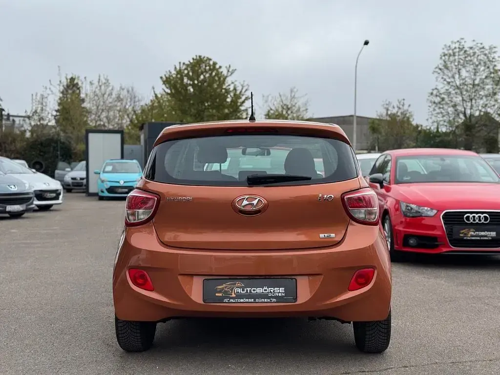 Gebraucht Hyundai i10 Intro Edition 87 PS (63 kW) 2014 Orange Kleinwagen