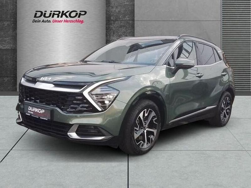 (exg) experience green met. (metallic) Gebraucht 2024 Kia Sportage Spirit SUV | 34.790 € (Fairer Preis) - Bild 1/4