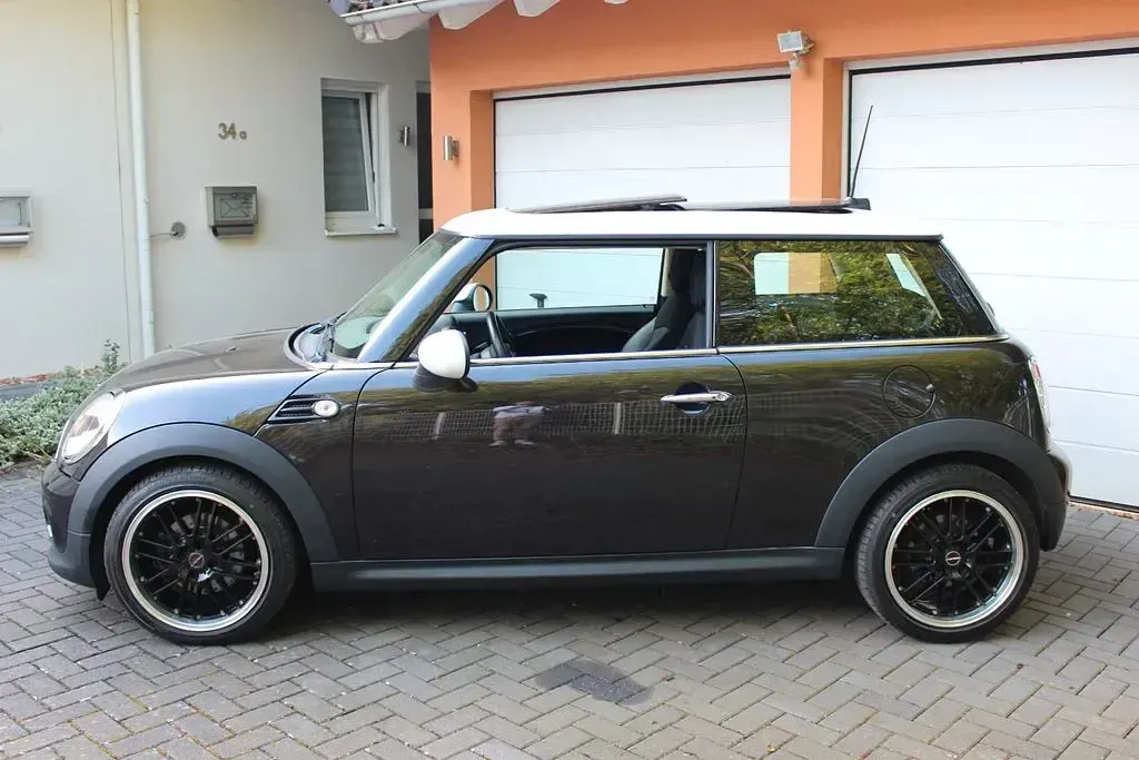 Gebraucht Mini Cooper 122 PS (89 kW) 2013 Braun Kleinwagen